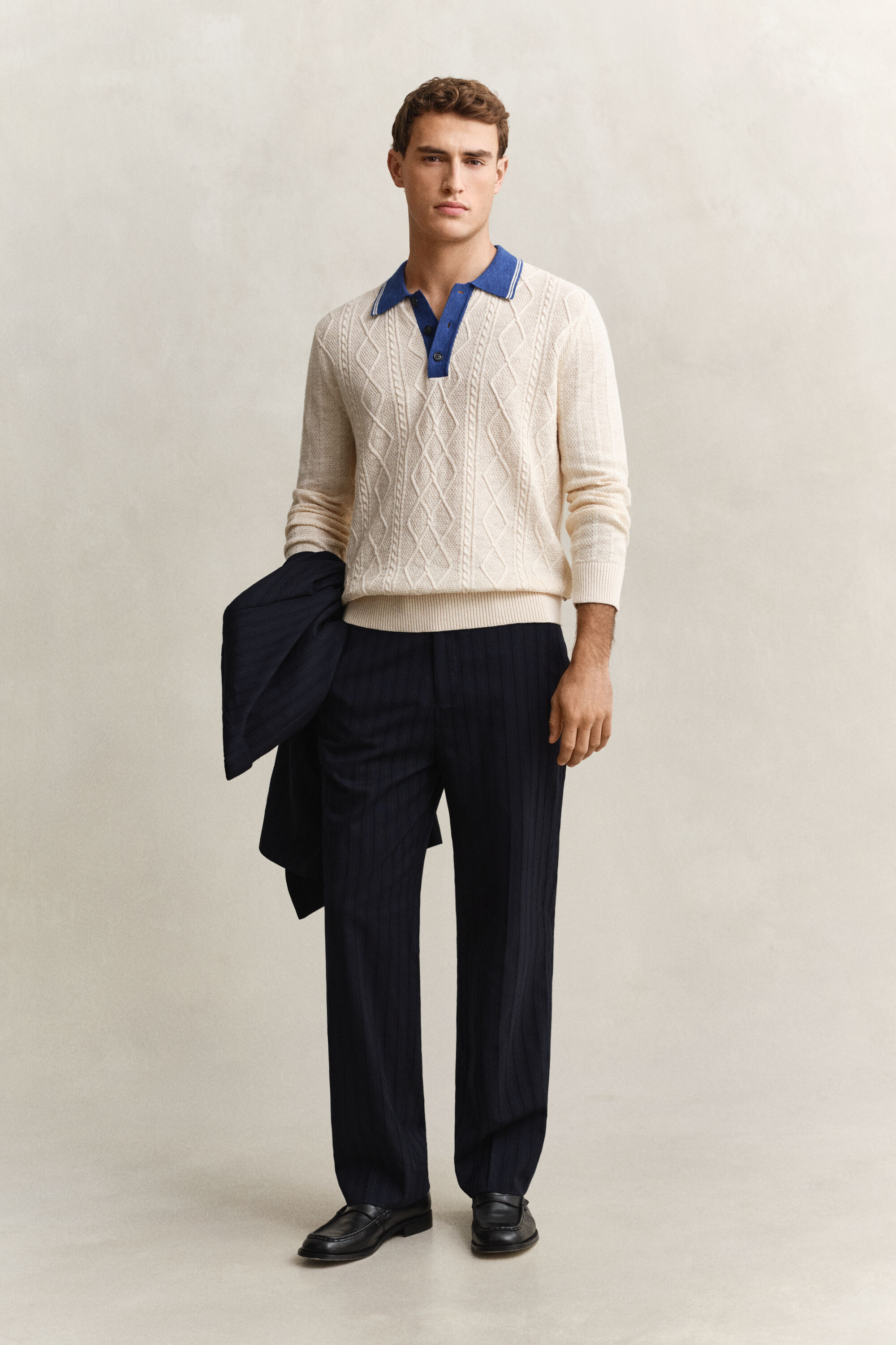 Polo in maglia a trecce