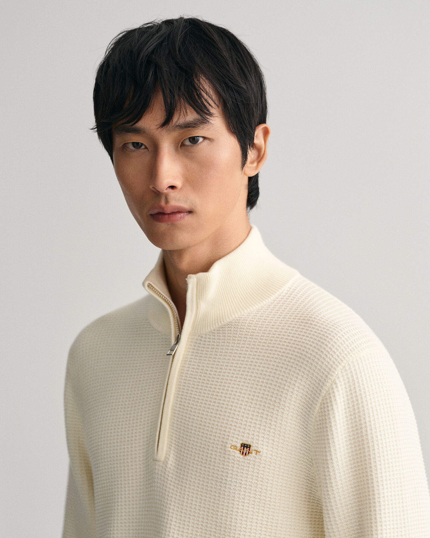 Maglia in cotone testurizzato con zip corta