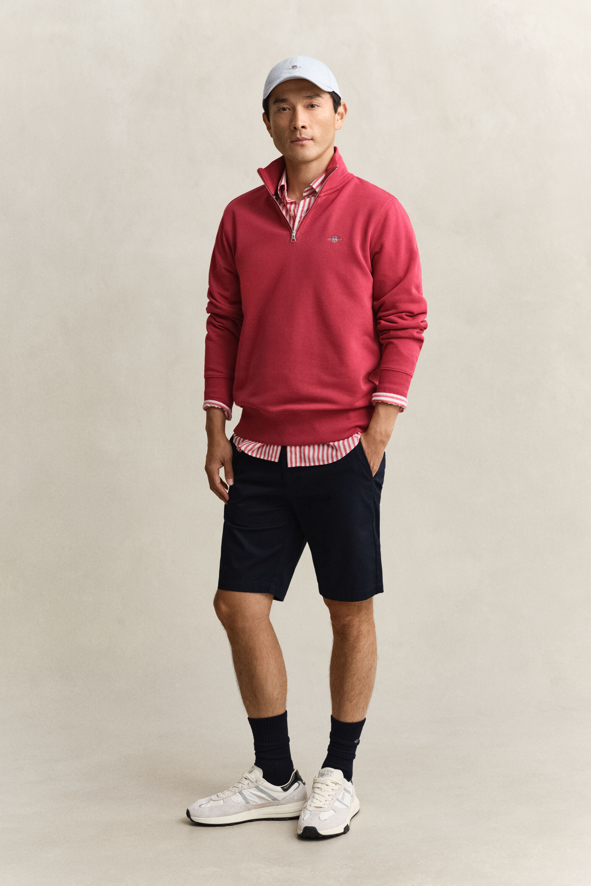 Felpa Shield con zip corta