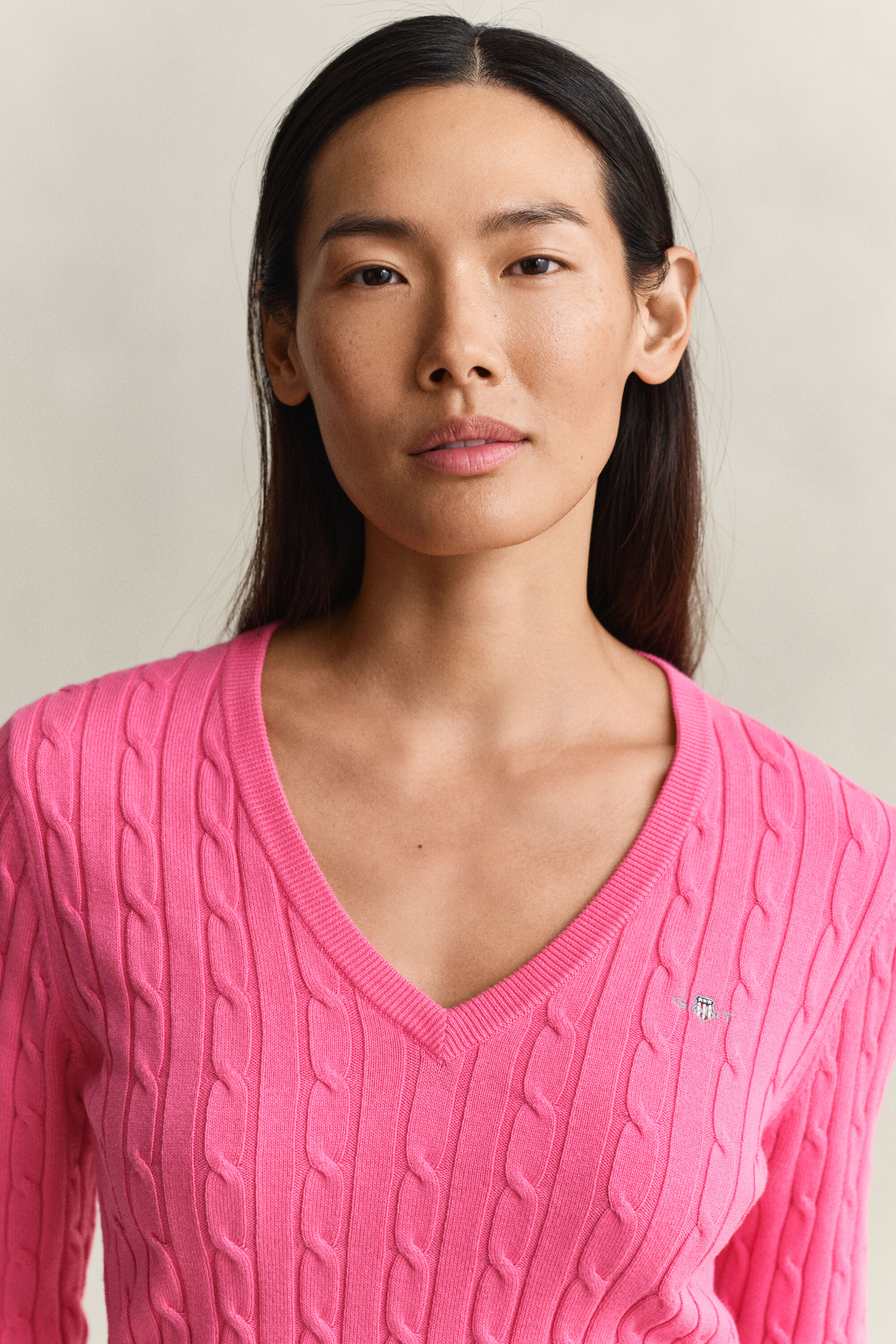 Maglia con scollo a V a trecce