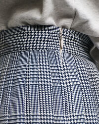 Gonna plissettata con stampa a quadri