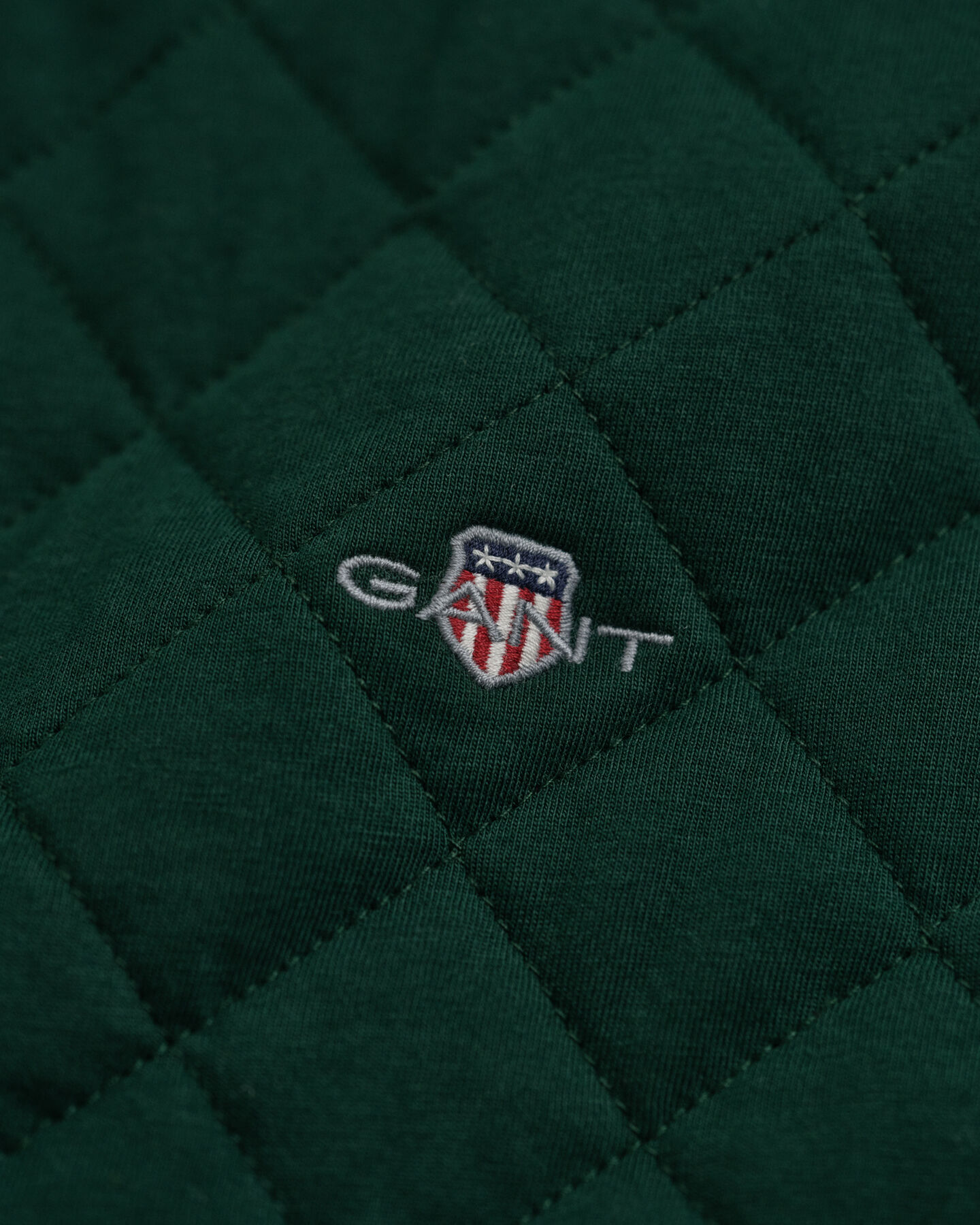 Felpa trapuntata con zip e colletto in velluto a coste