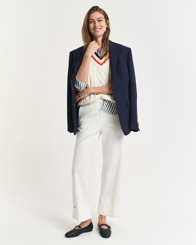 Pantaloni con piega e risvolto