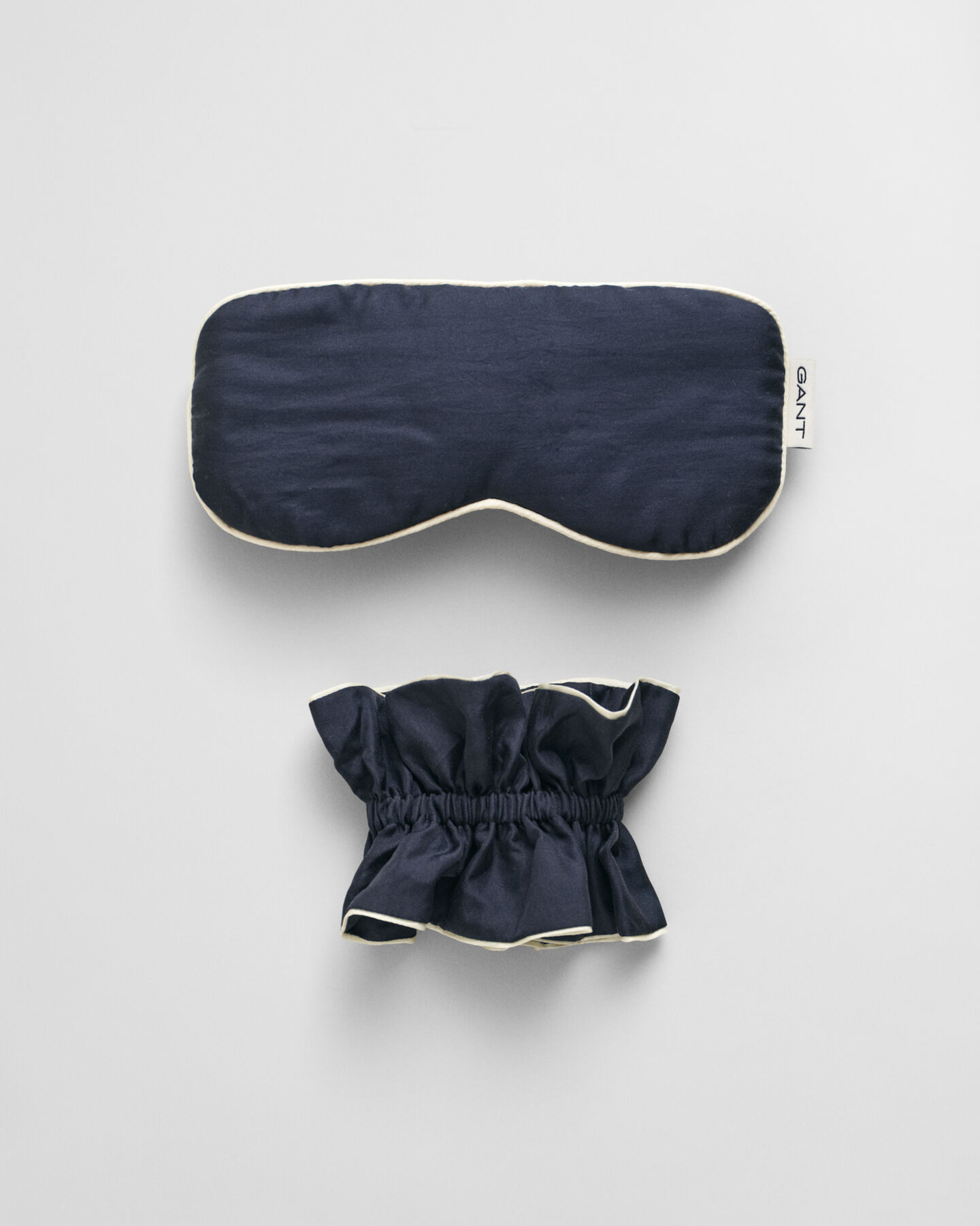 Set regalo con mascherina da notte in seta e fermacoda