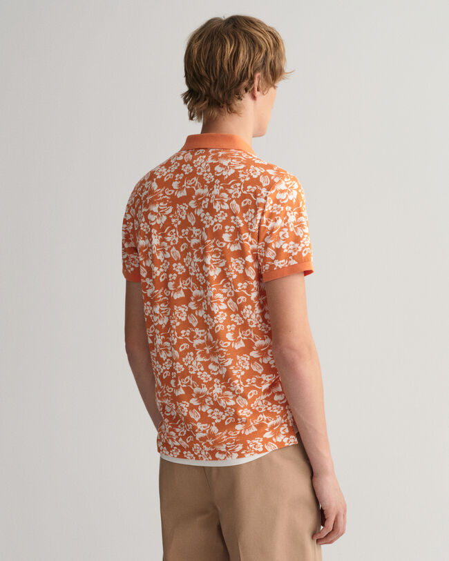 Polo in piqu&eacute; con stampa a fiori