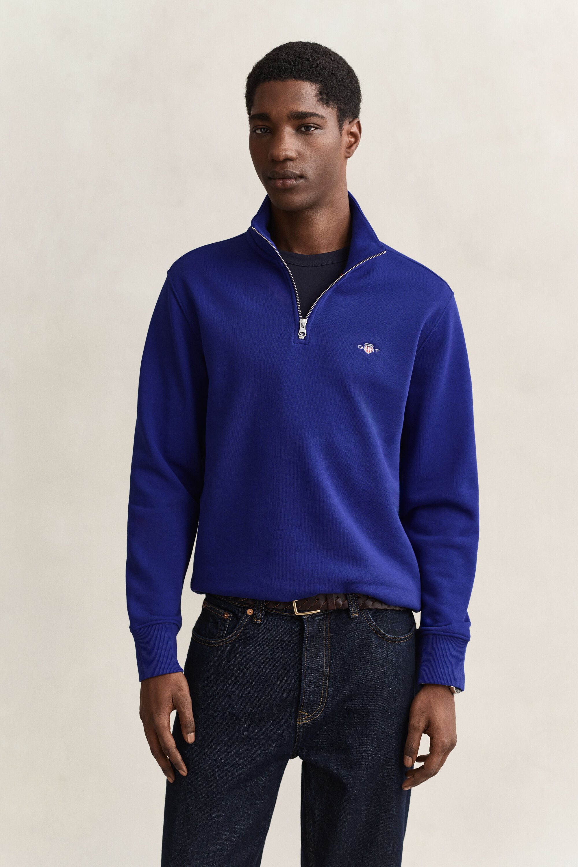 Felpa Shield con zip corta