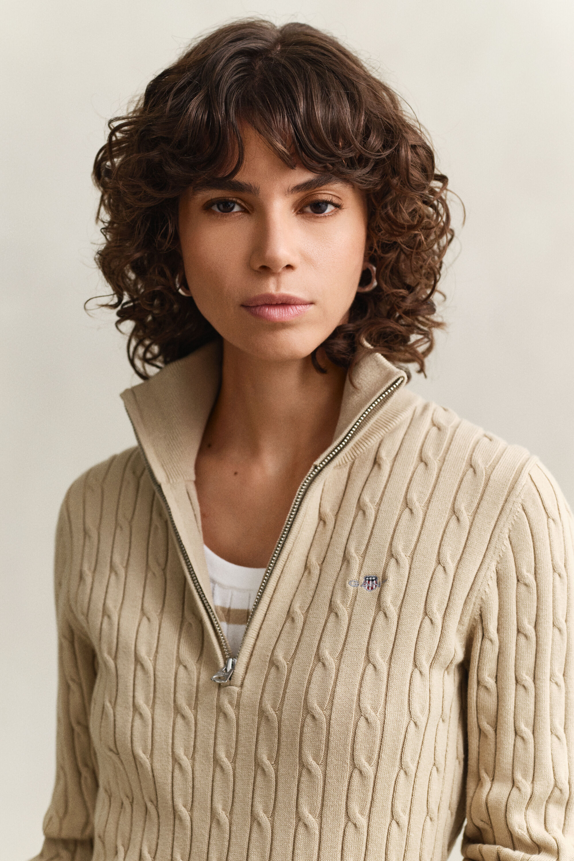 Maglia con zip corta a trecce