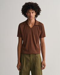 Polo in piqu&eacute; ispirata agli anni &lsquo;70