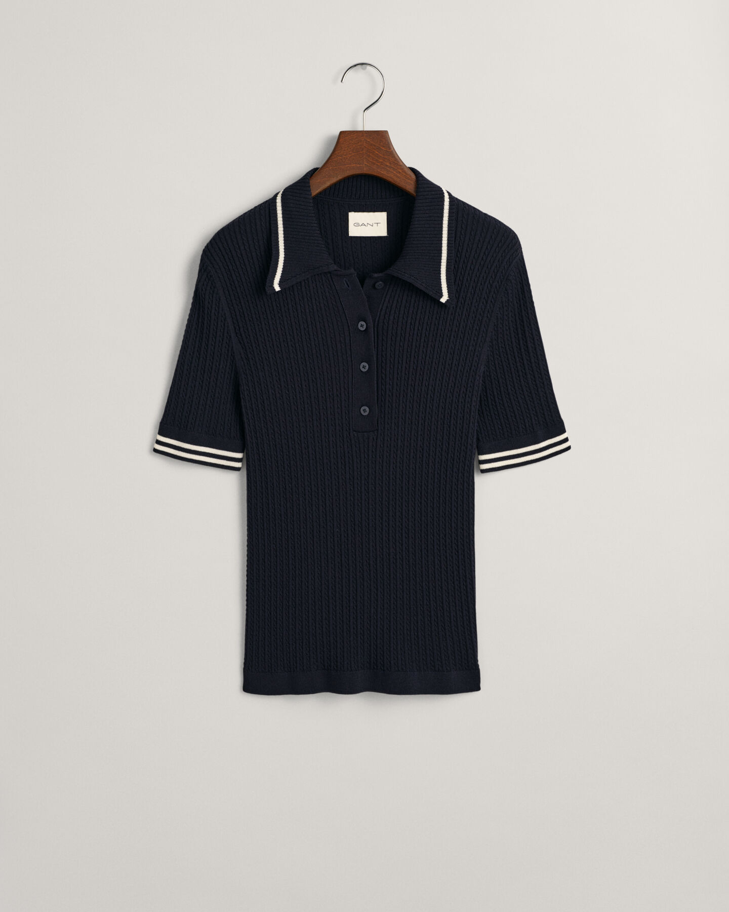 Polo in mini maglia a trecce