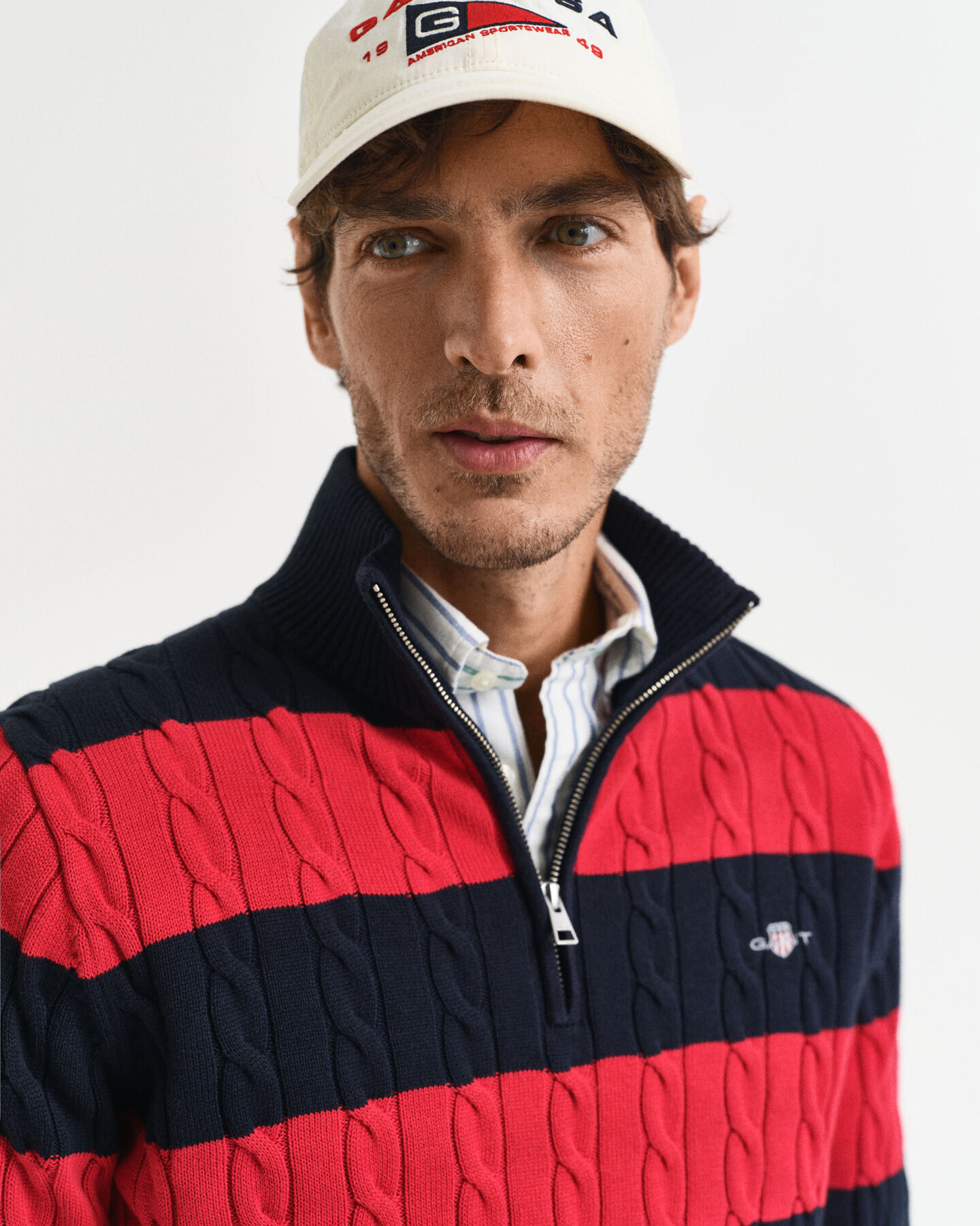 Maglia a righe in cotone a trecce con zip corta