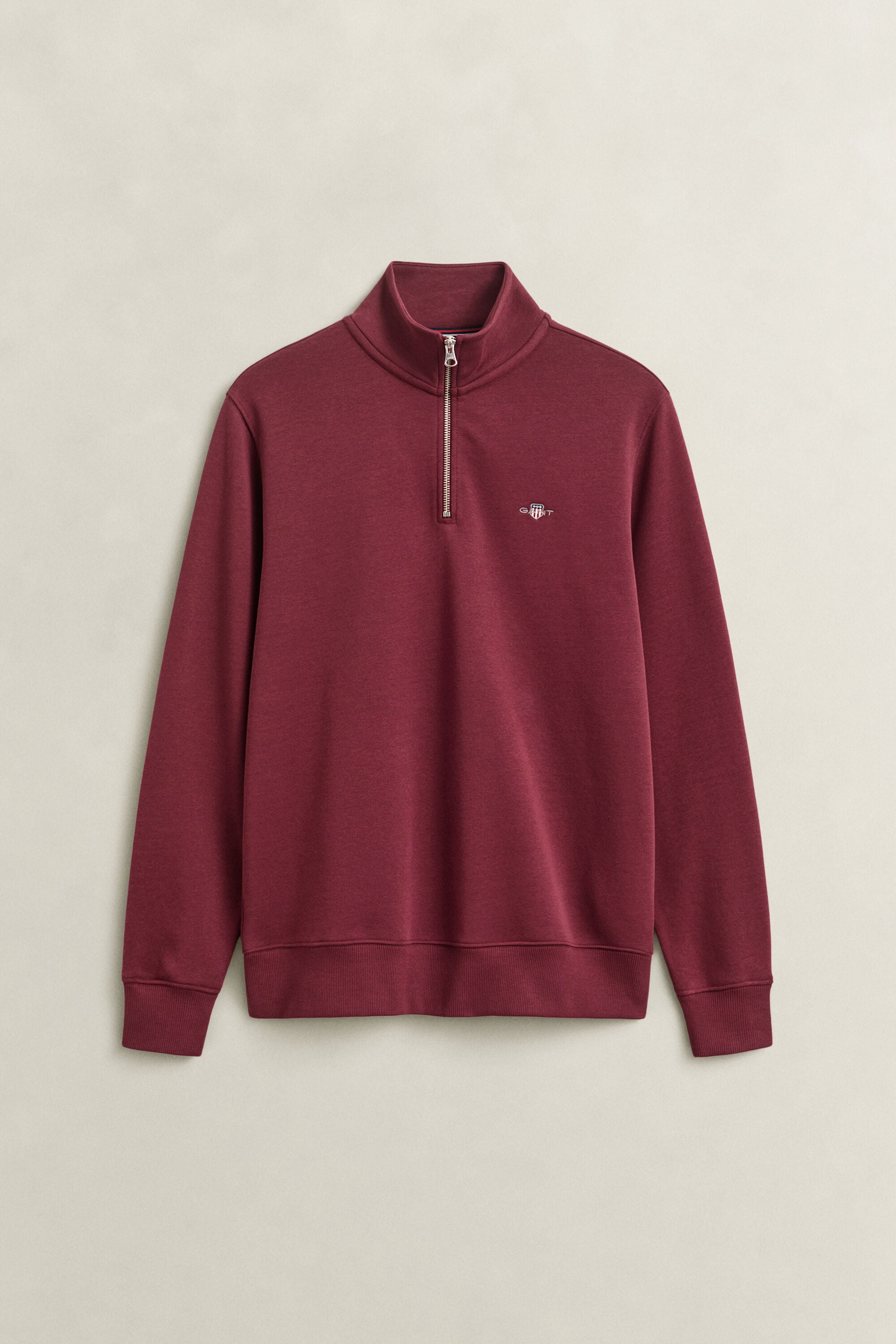 Felpa Shield con zip corta