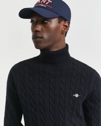 Maglia a collo alto in cotone a trecce