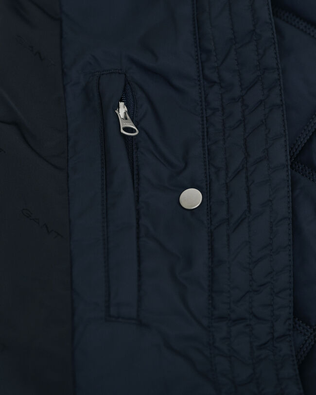 Cappotto trapuntato con finiture in velluto a coste