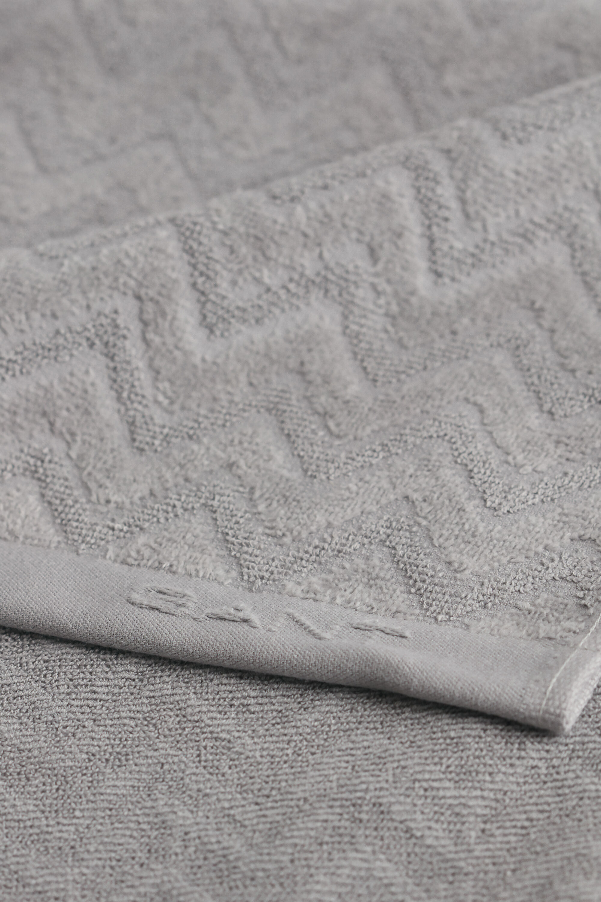 Asciugamano jacquard con motivo a spina di pesce 30 x 50