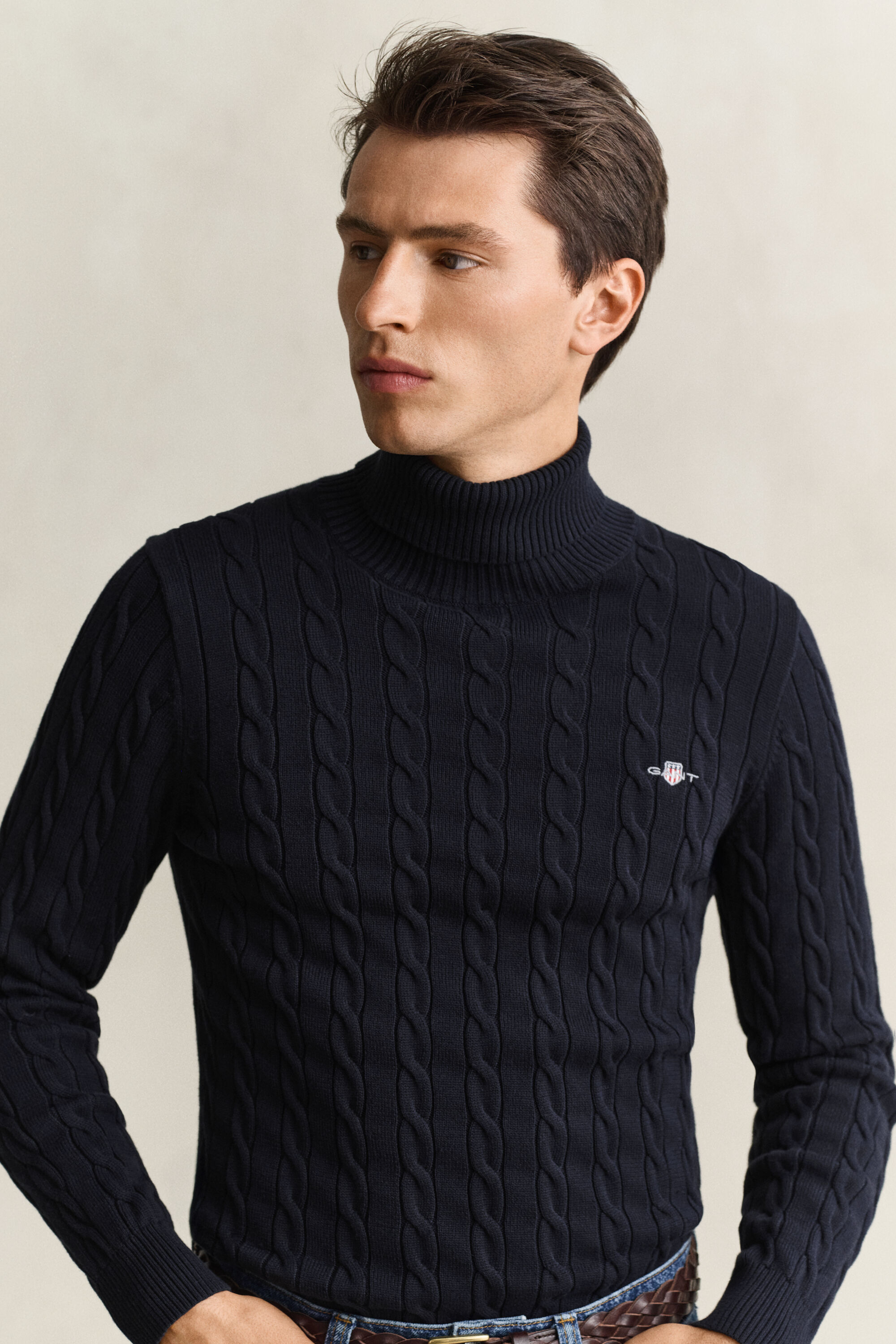Maglia a collo alto in cotone a trecce