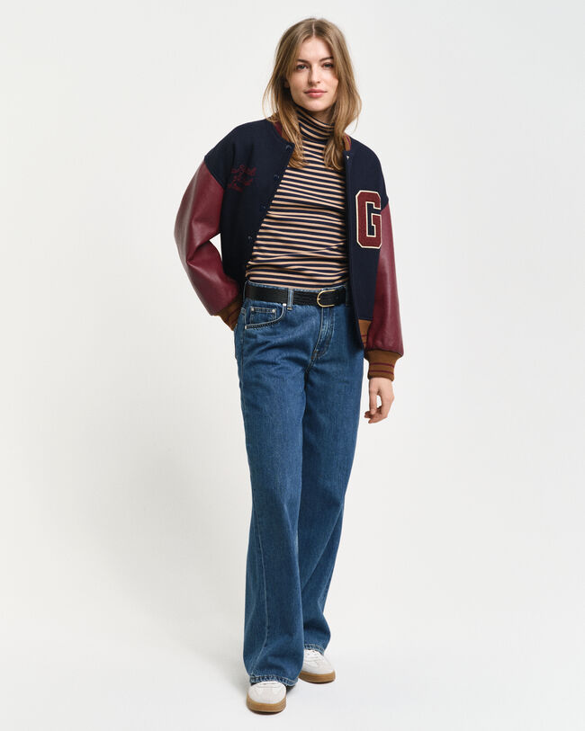 Collo alto a coste e maniche lunghe a righe