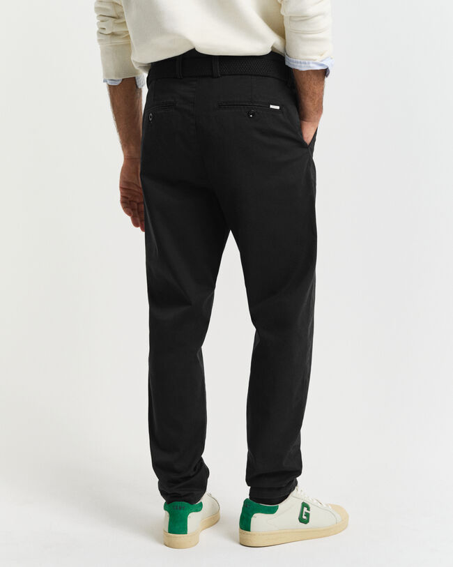 Pantaloni chino in twill stretti in fondo