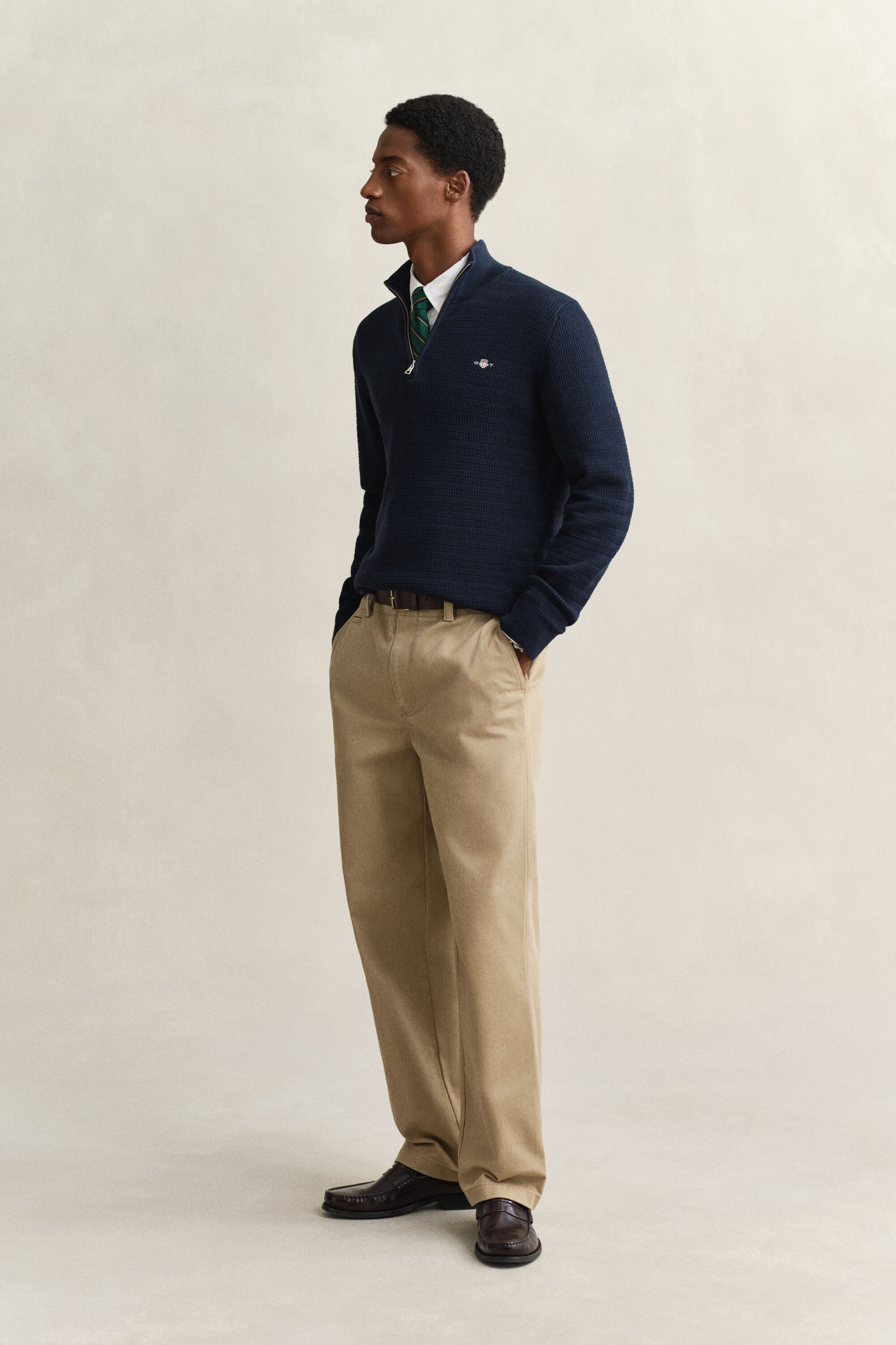 Maglia con zip corta a mini trecce