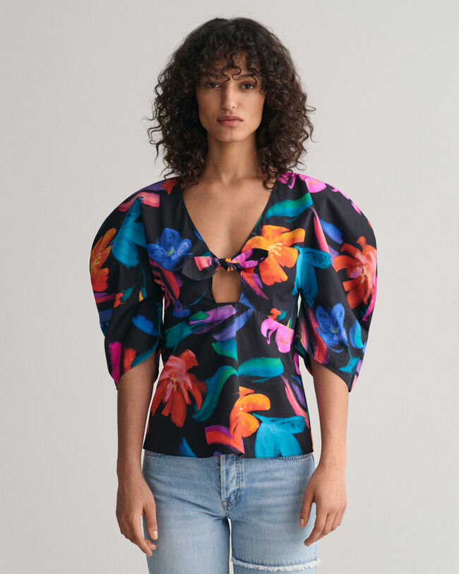 Blusa con stampa floreale e maniche voluminose