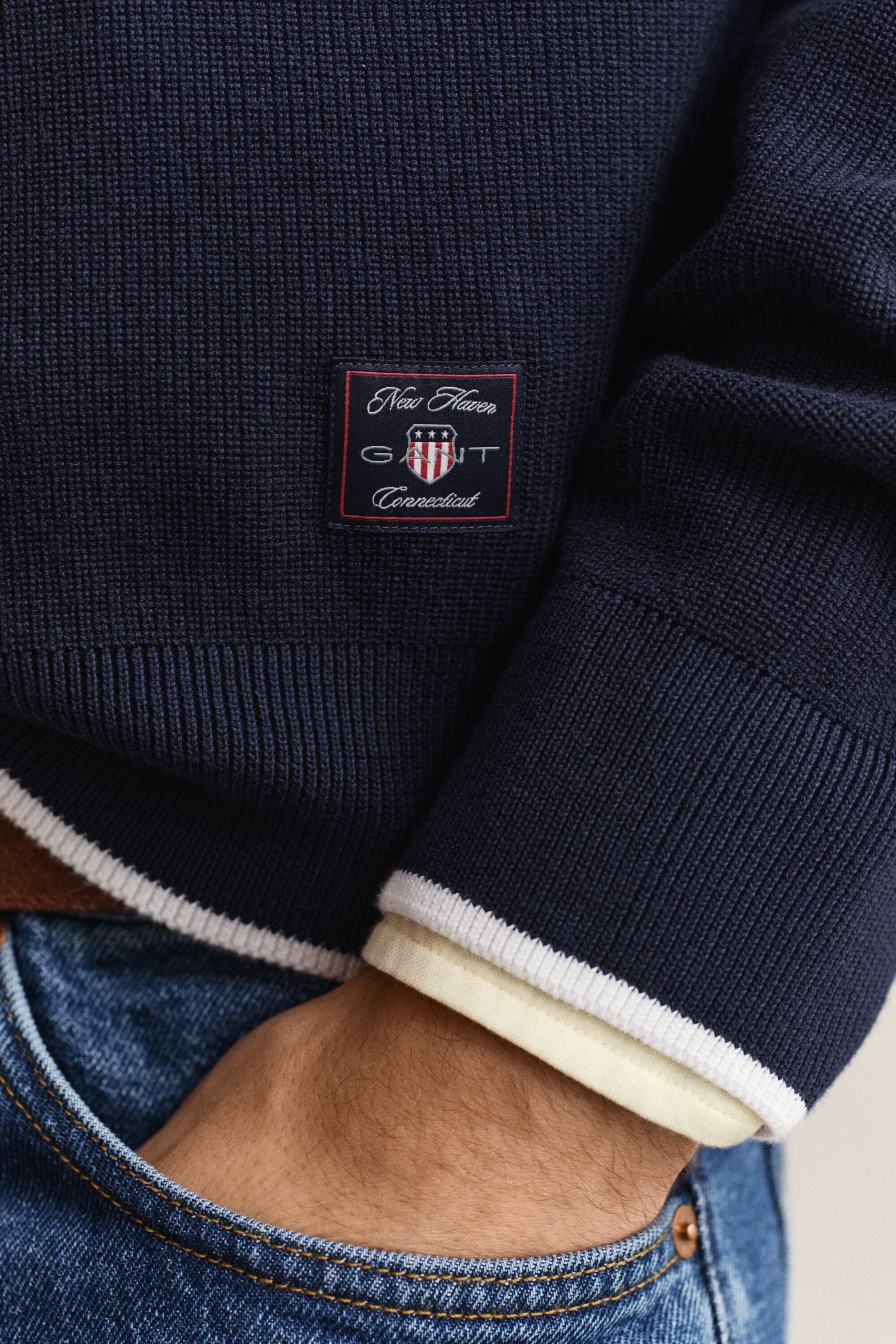 Maglia in cotone a coste con zip corta