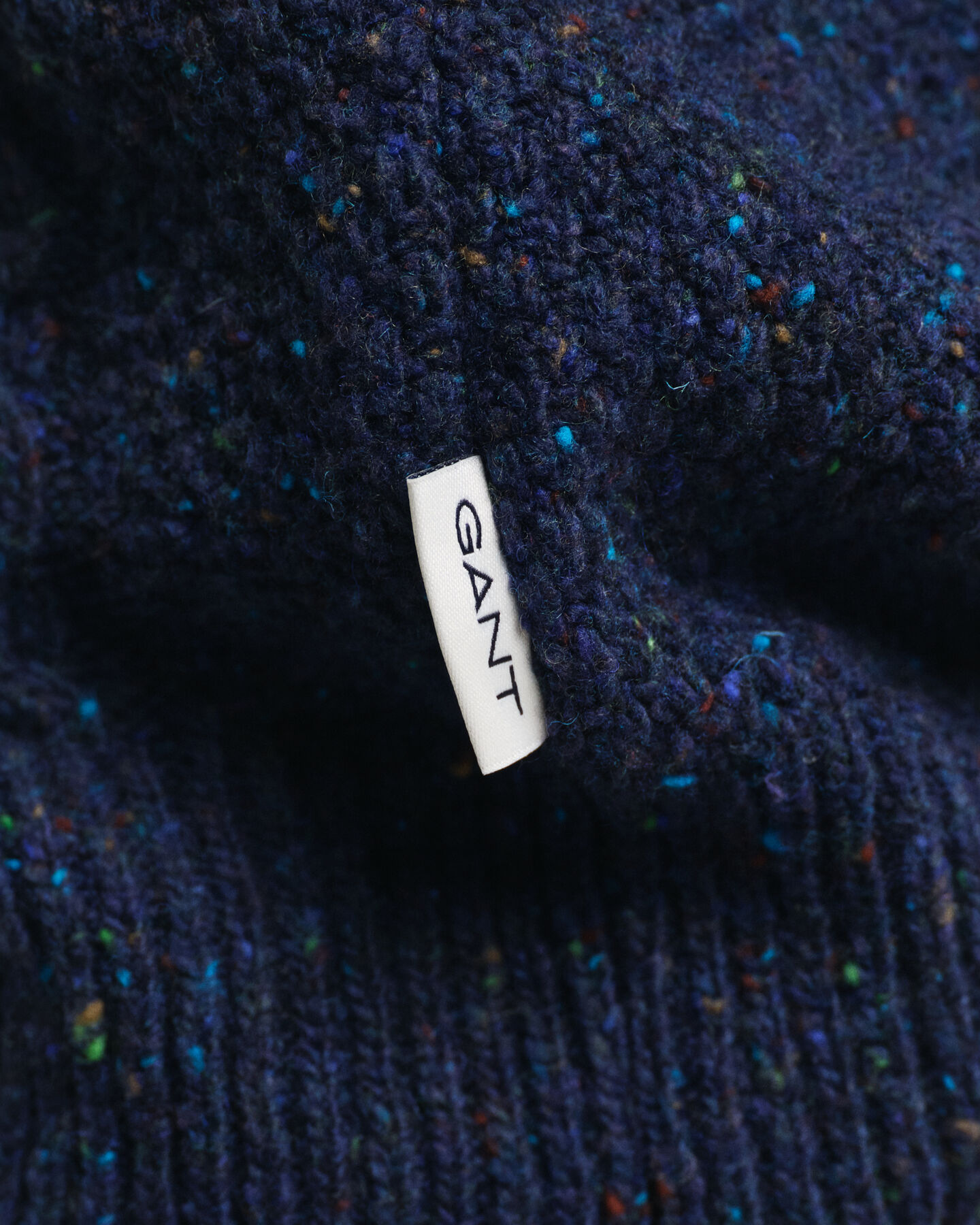 Cardigan con zip lavorato a trecce