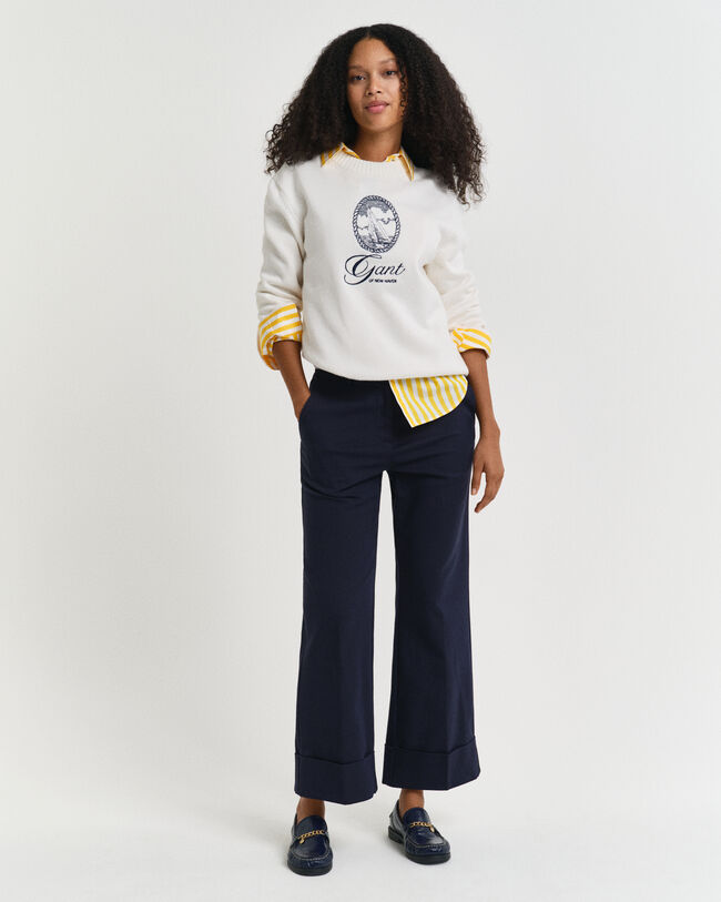 Pantaloni con piega e risvolto