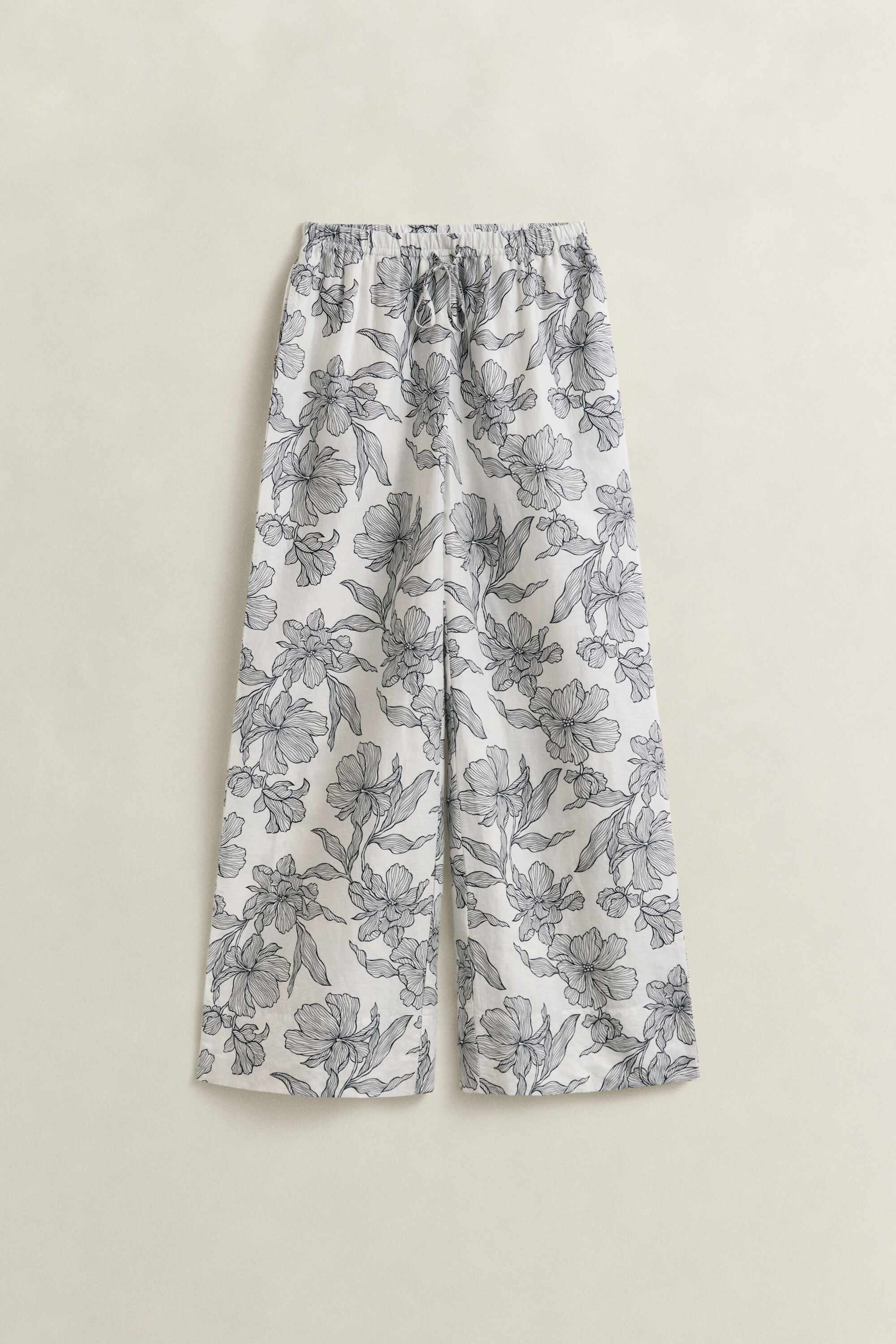 Pantaloni in lino con stampa floreale
