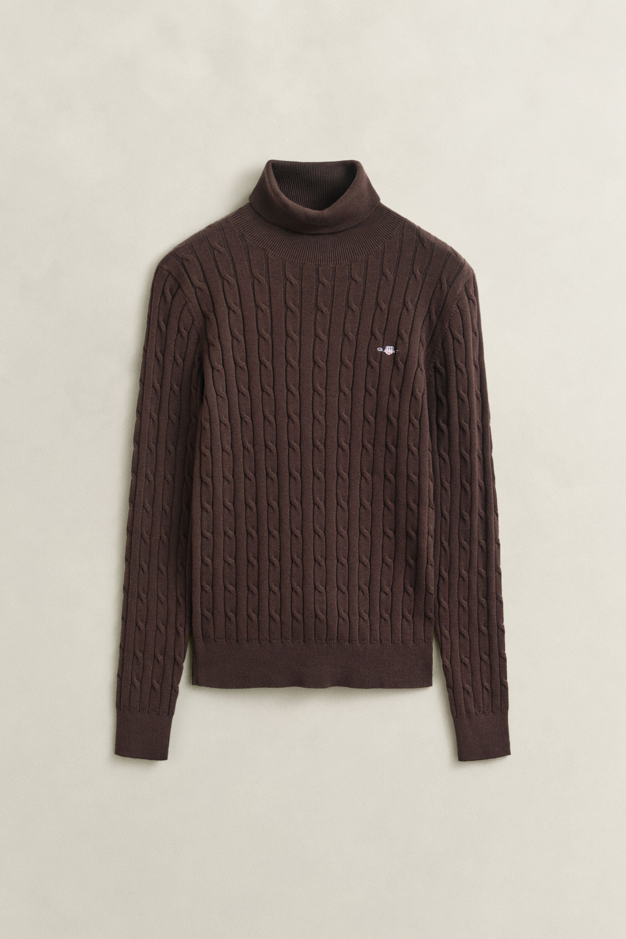 Maglia a collo alto in cotone elasticizzato a trecce
