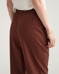 Pantaloni pull-on stretti in fondo