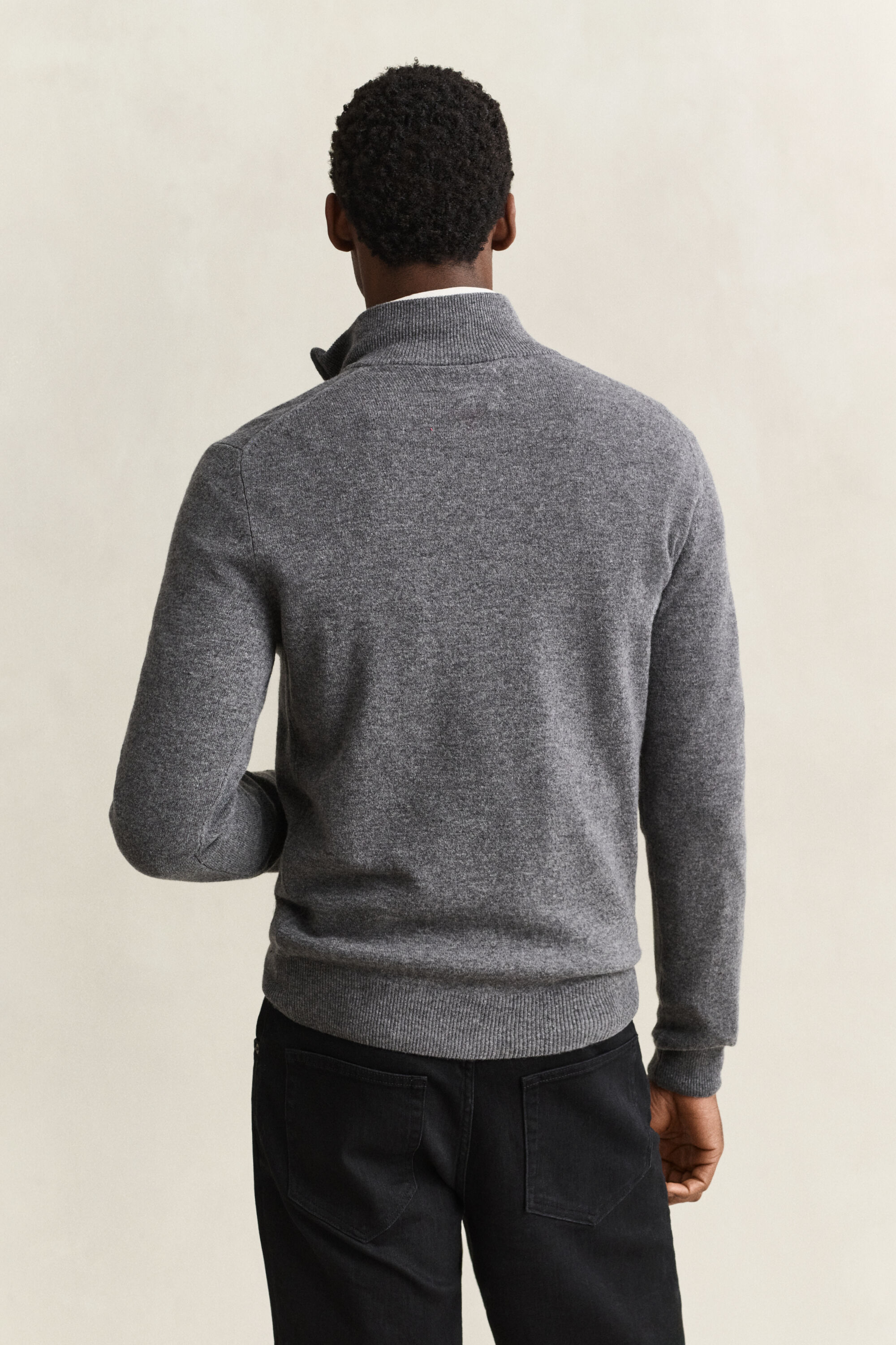 Maglia in lana d’agnello con zip corta