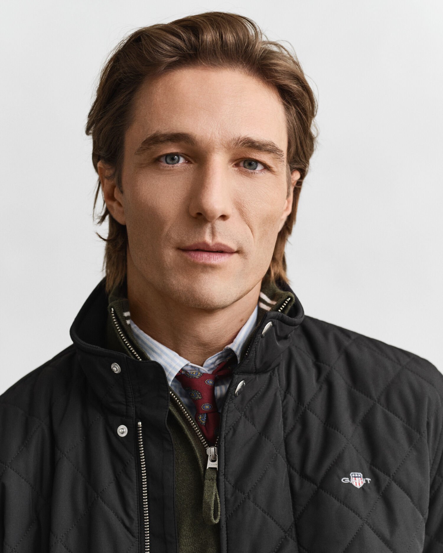 Piumino trapuntato Windcheater di media lunghezza