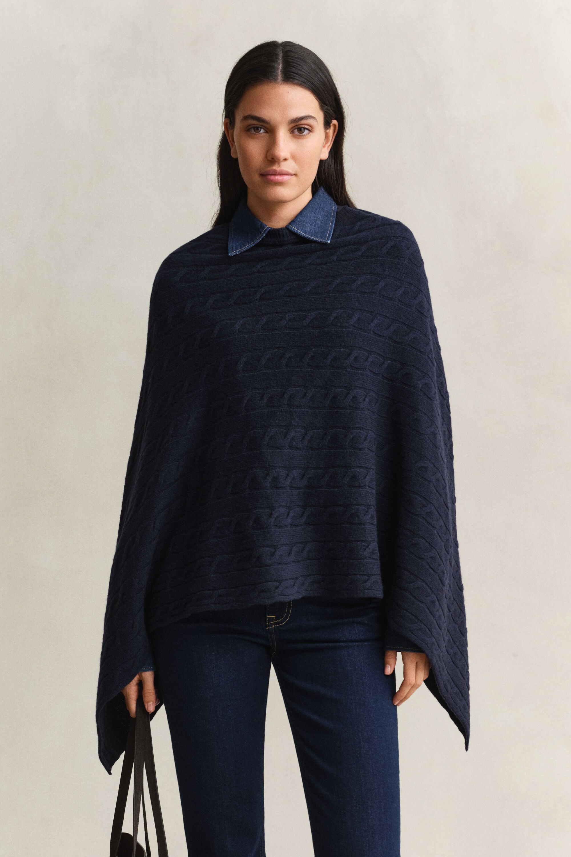 Poncho a trecce in lana