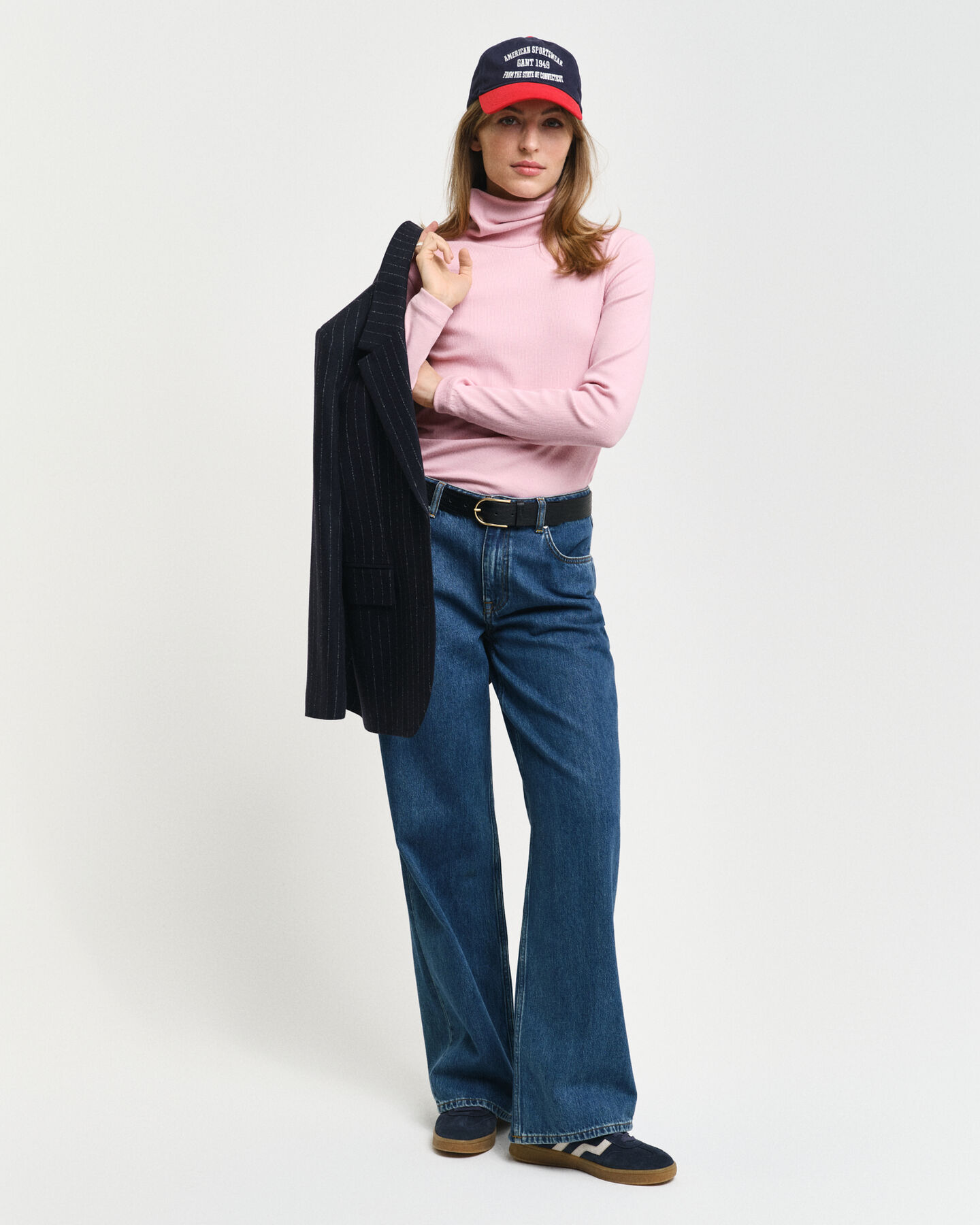 Collo alto e maniche lunghe a coste