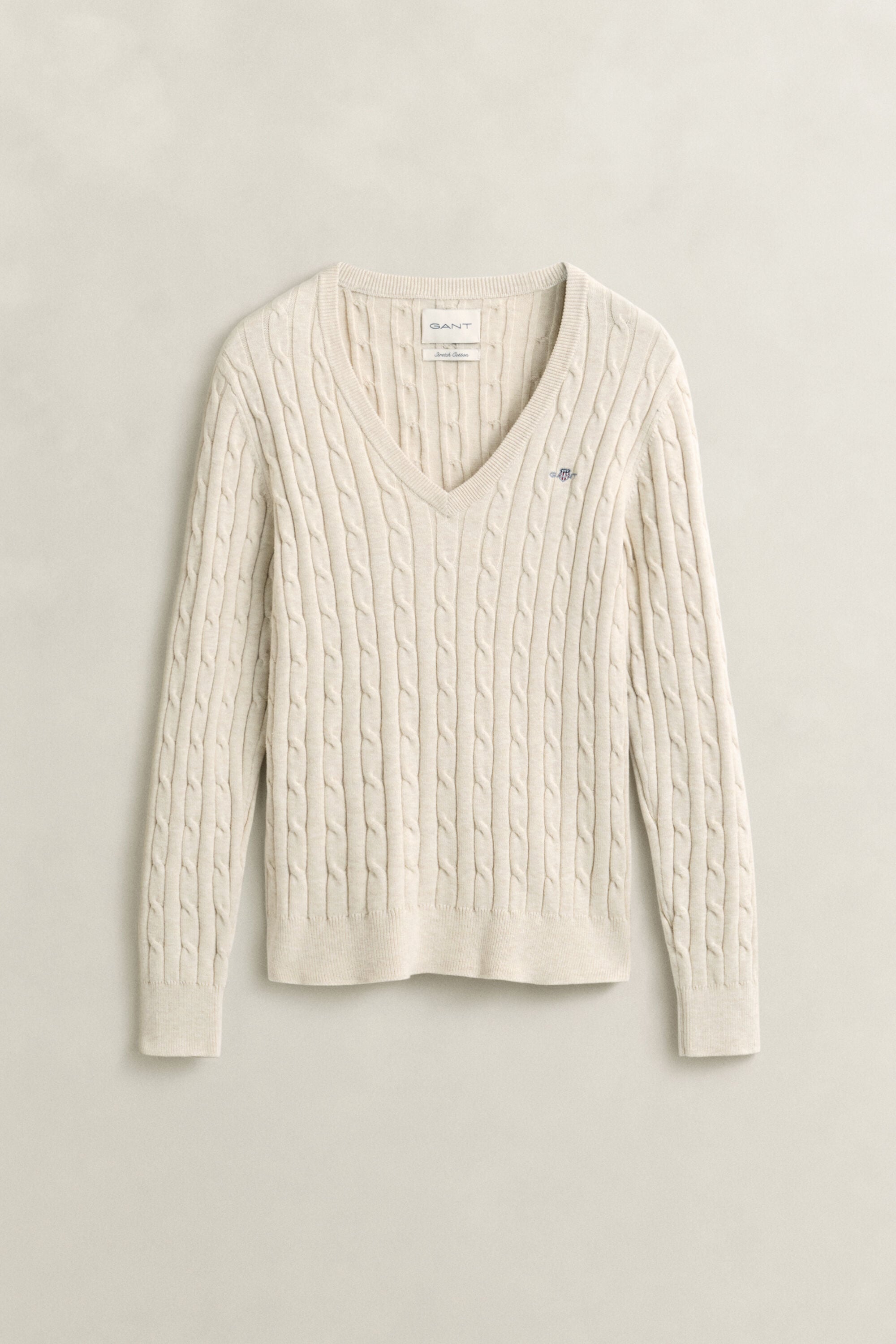 Maglia con scollo a V in cotone elasticizzato a trecce