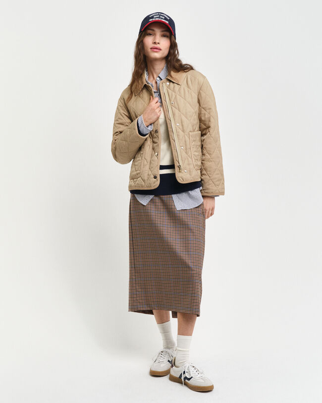 Piumino trapuntato con dettagli in velluto a coste