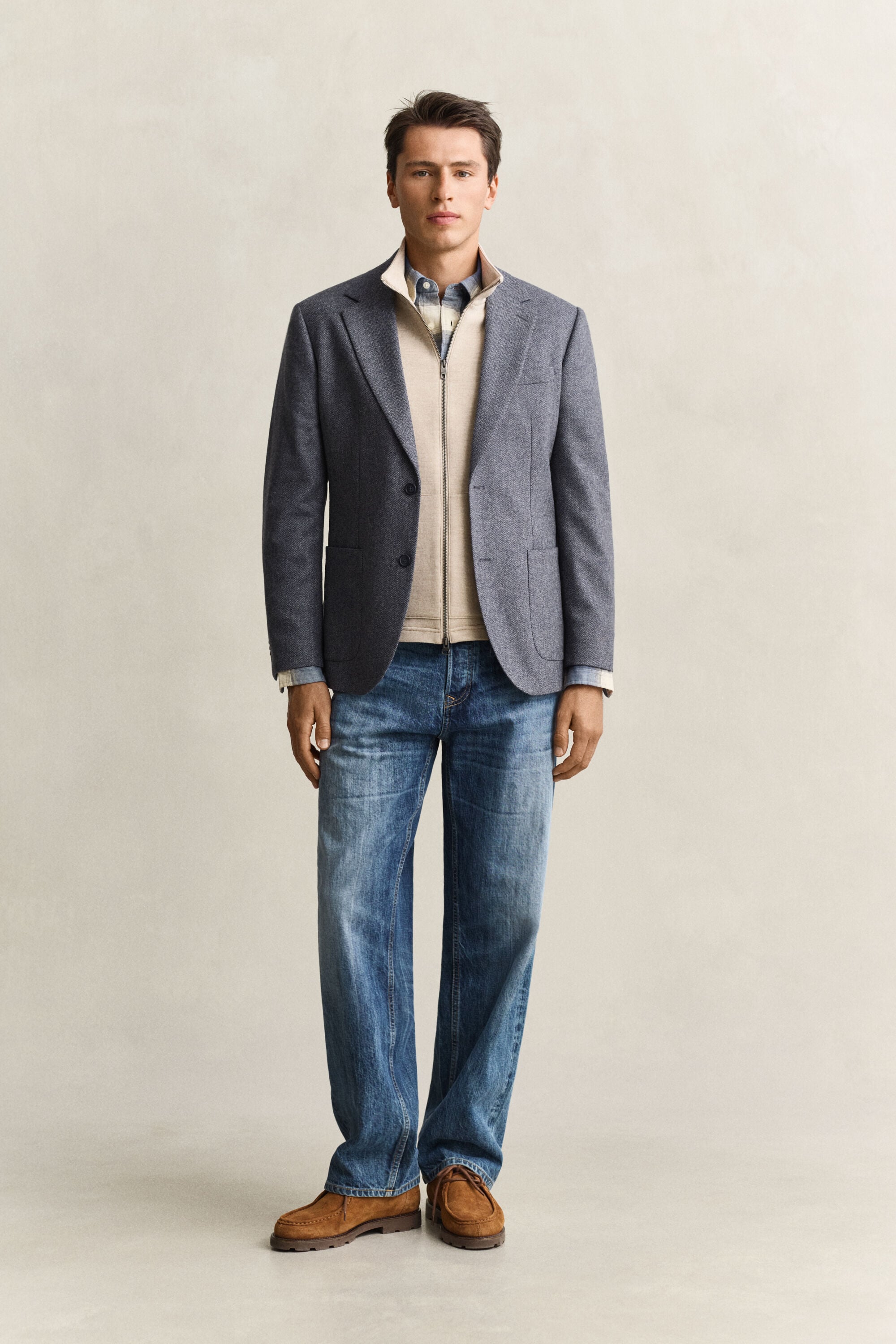 Piumino smanicato con zip