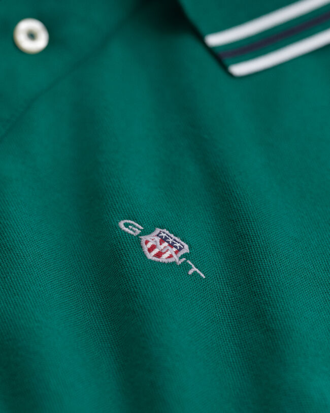 Polo con colletto e dettagli a contrasto