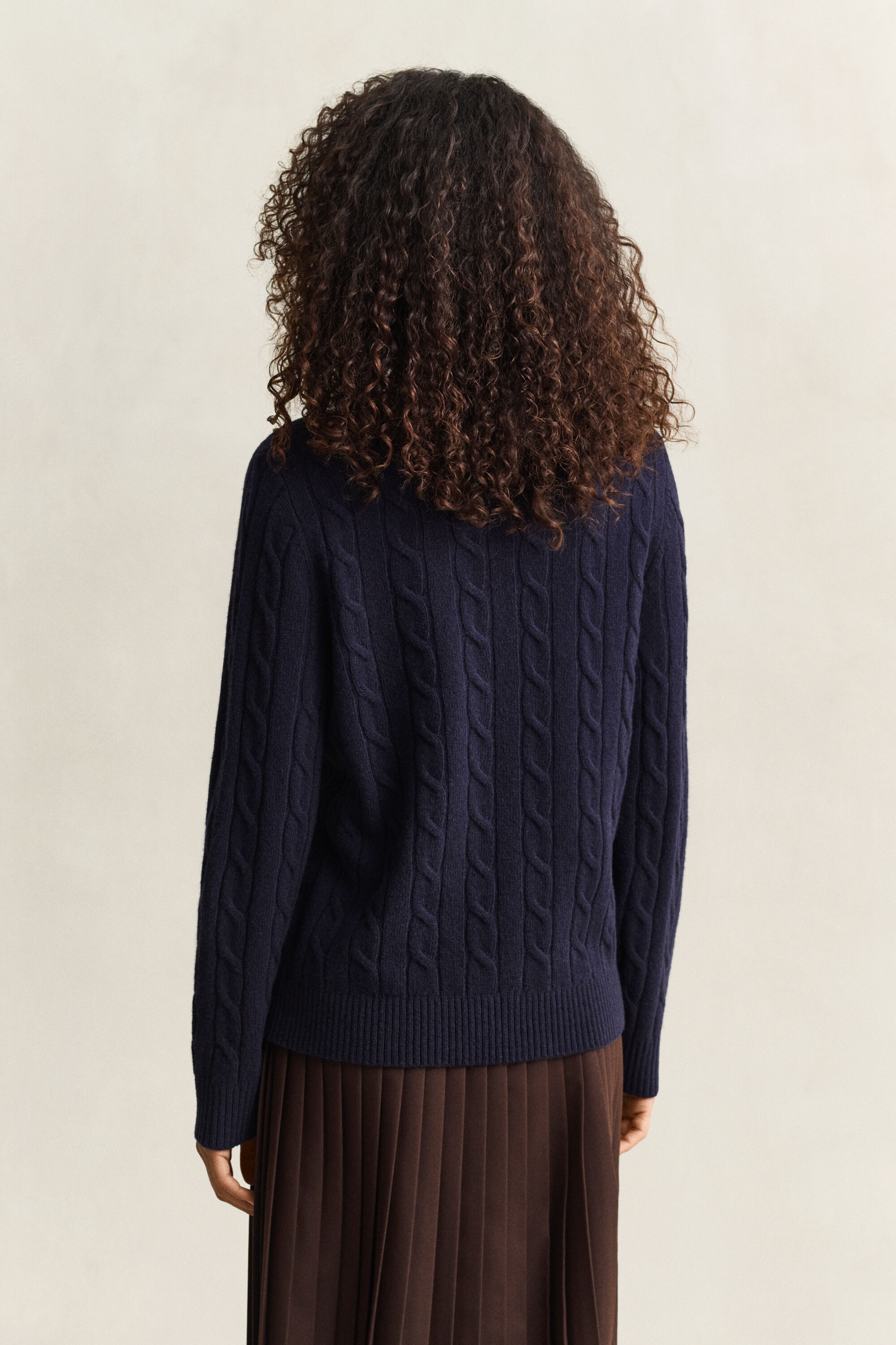 Maglia a trecce in lana d’agnello