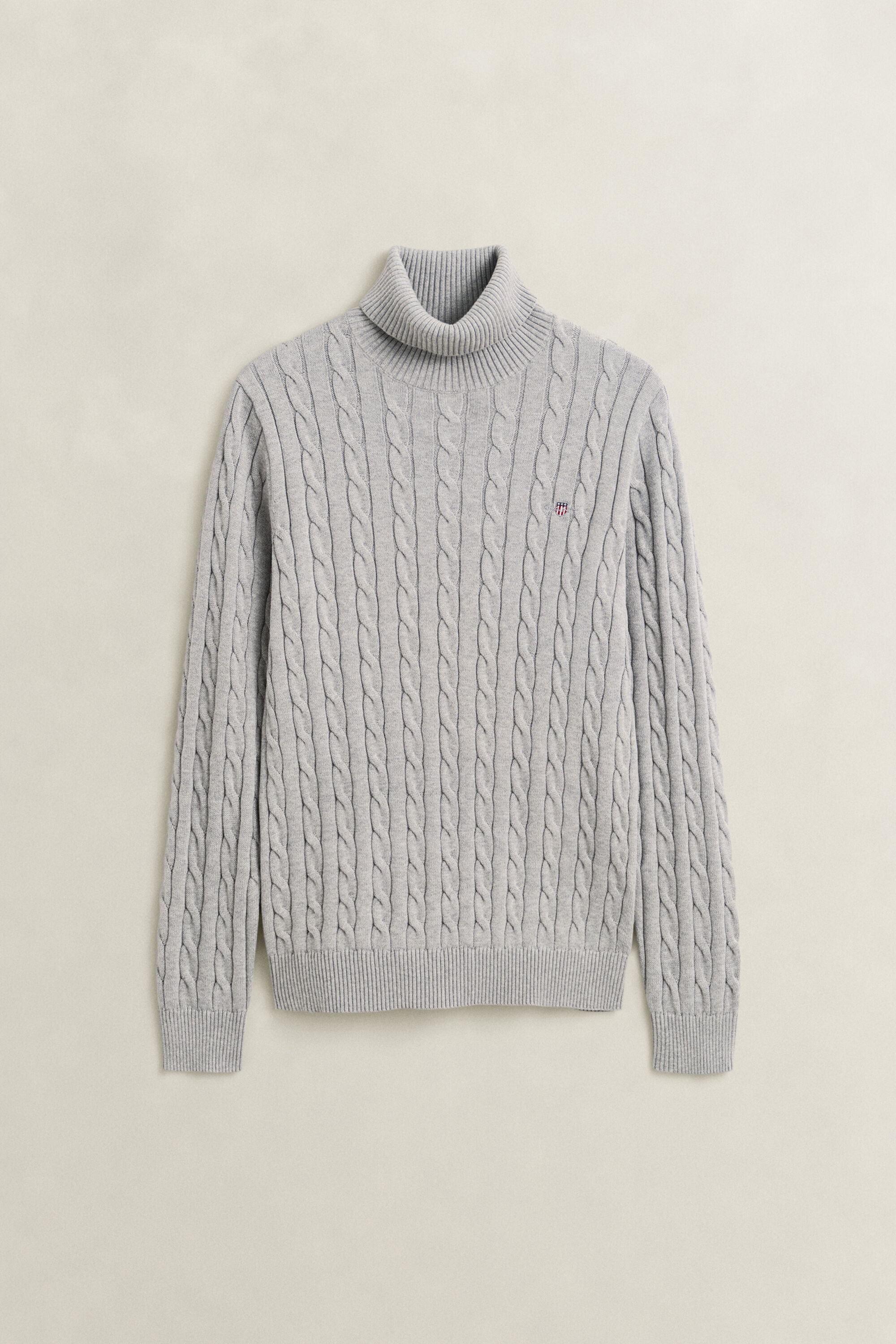 Maglia a collo alto in cotone a trecce