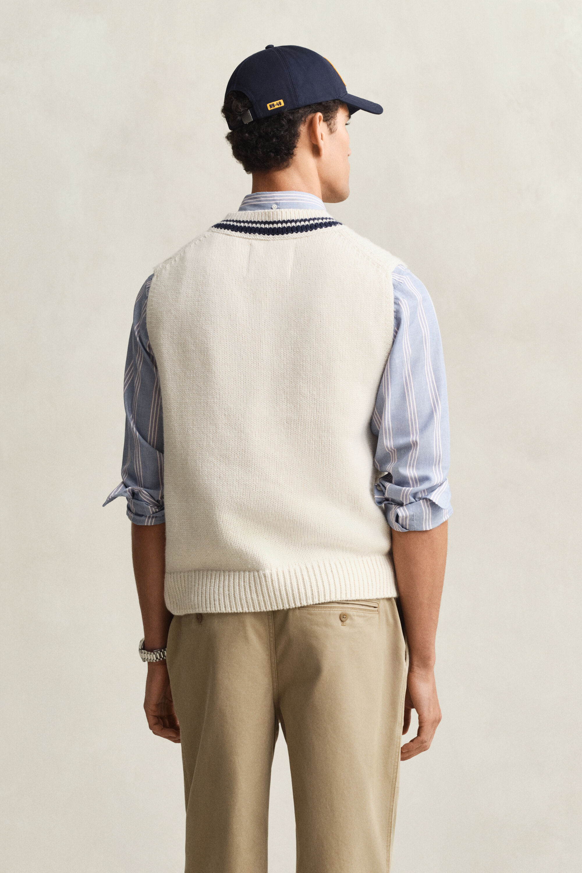 Smanicato in maglia a trecce