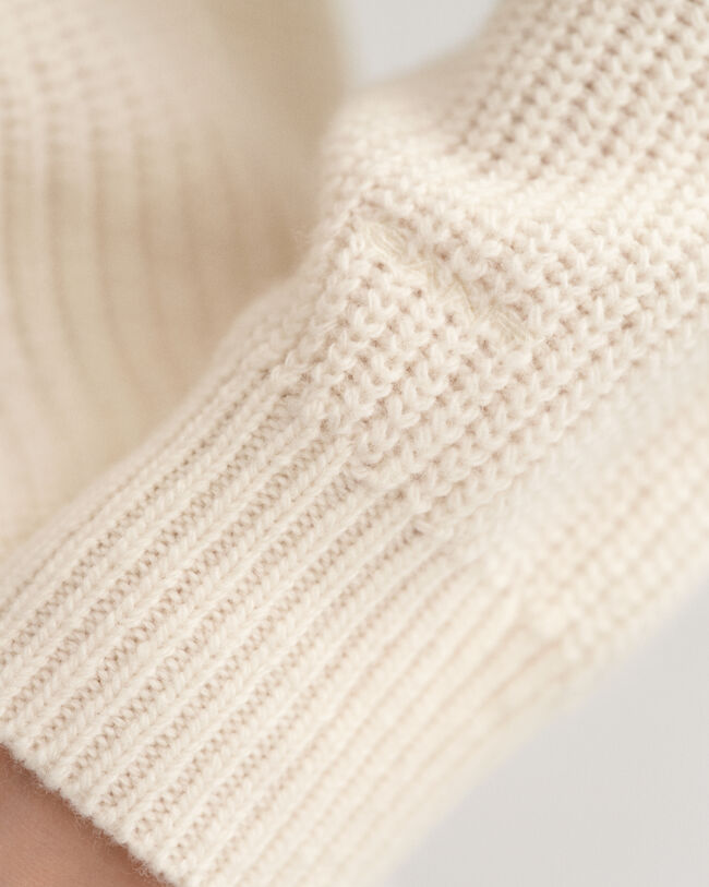 Maglia con scollo a V in lana a coste