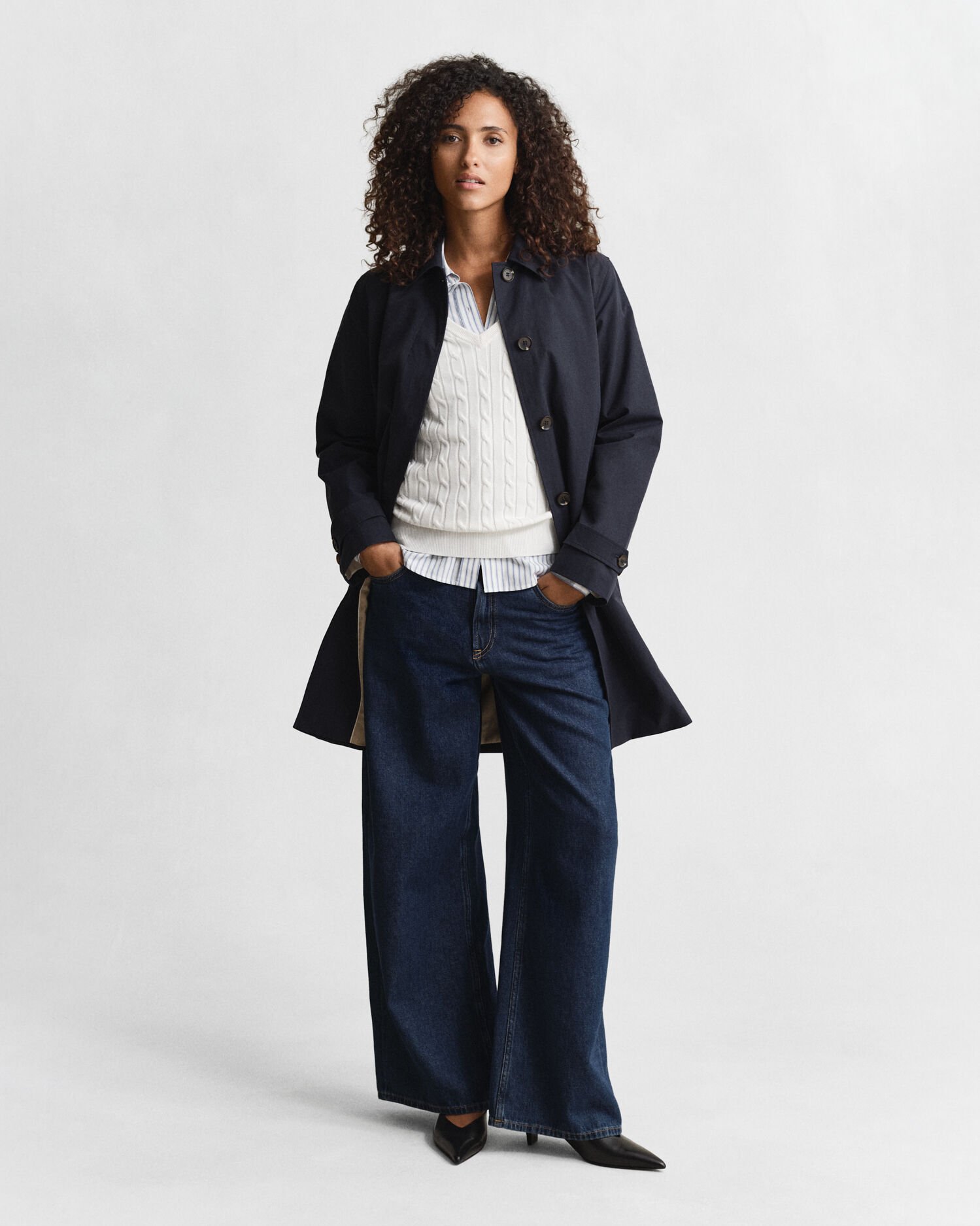 Maglia con scollo a V in cotone elasticizzato a trecce