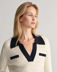 Polo in maglia a trecce