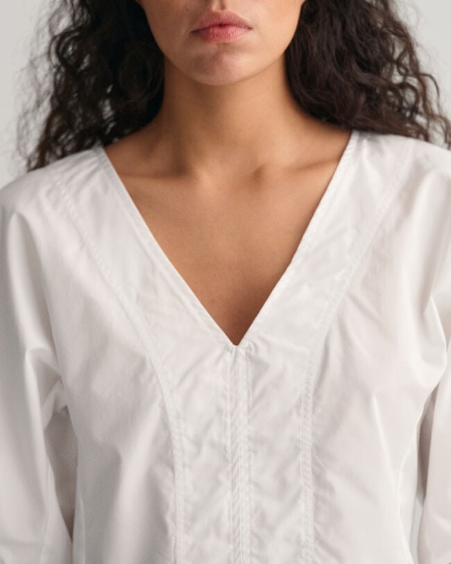 Top con scollo a V e maniche a palloncino