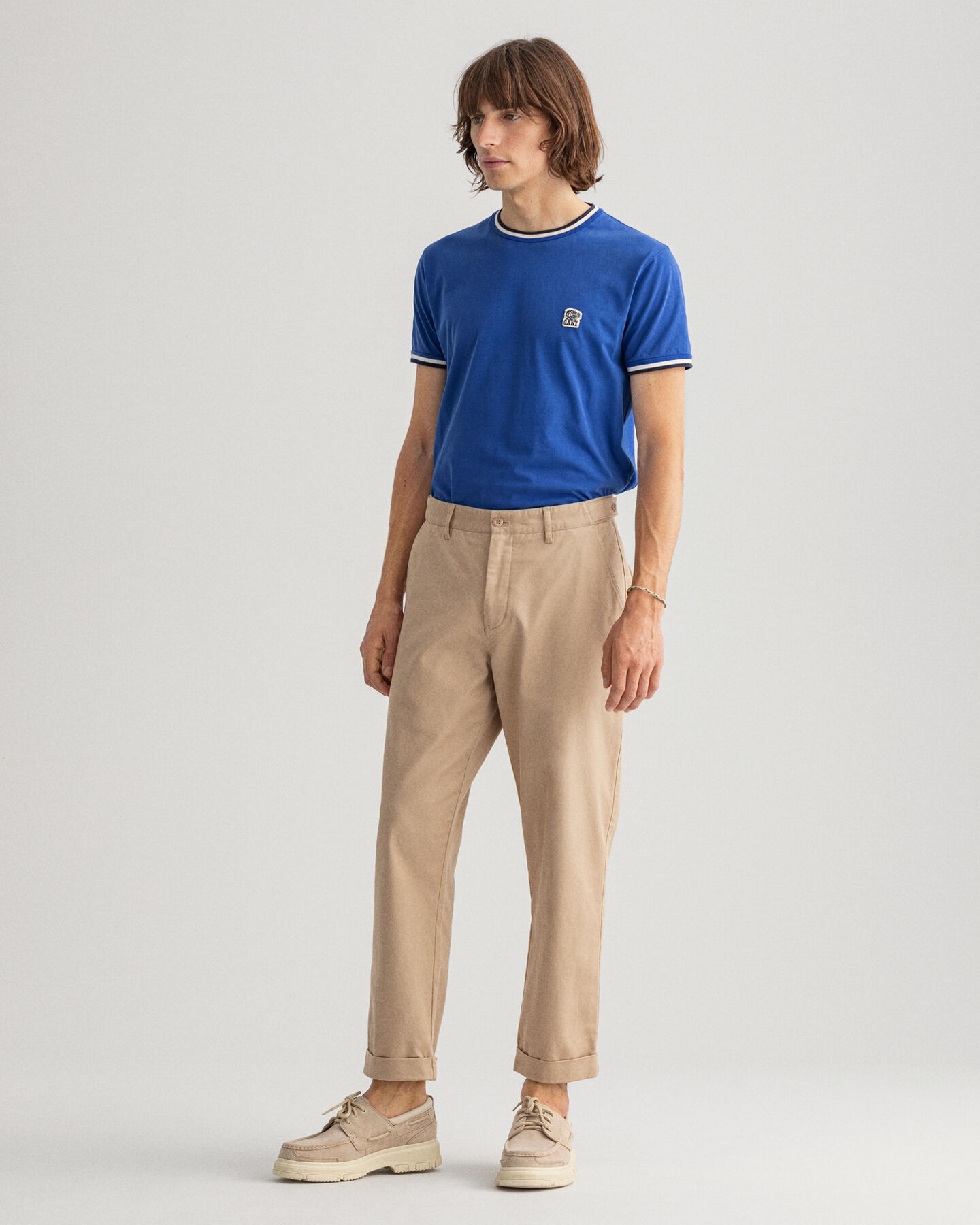 Pantaloni chino in cotone stretti in fondo