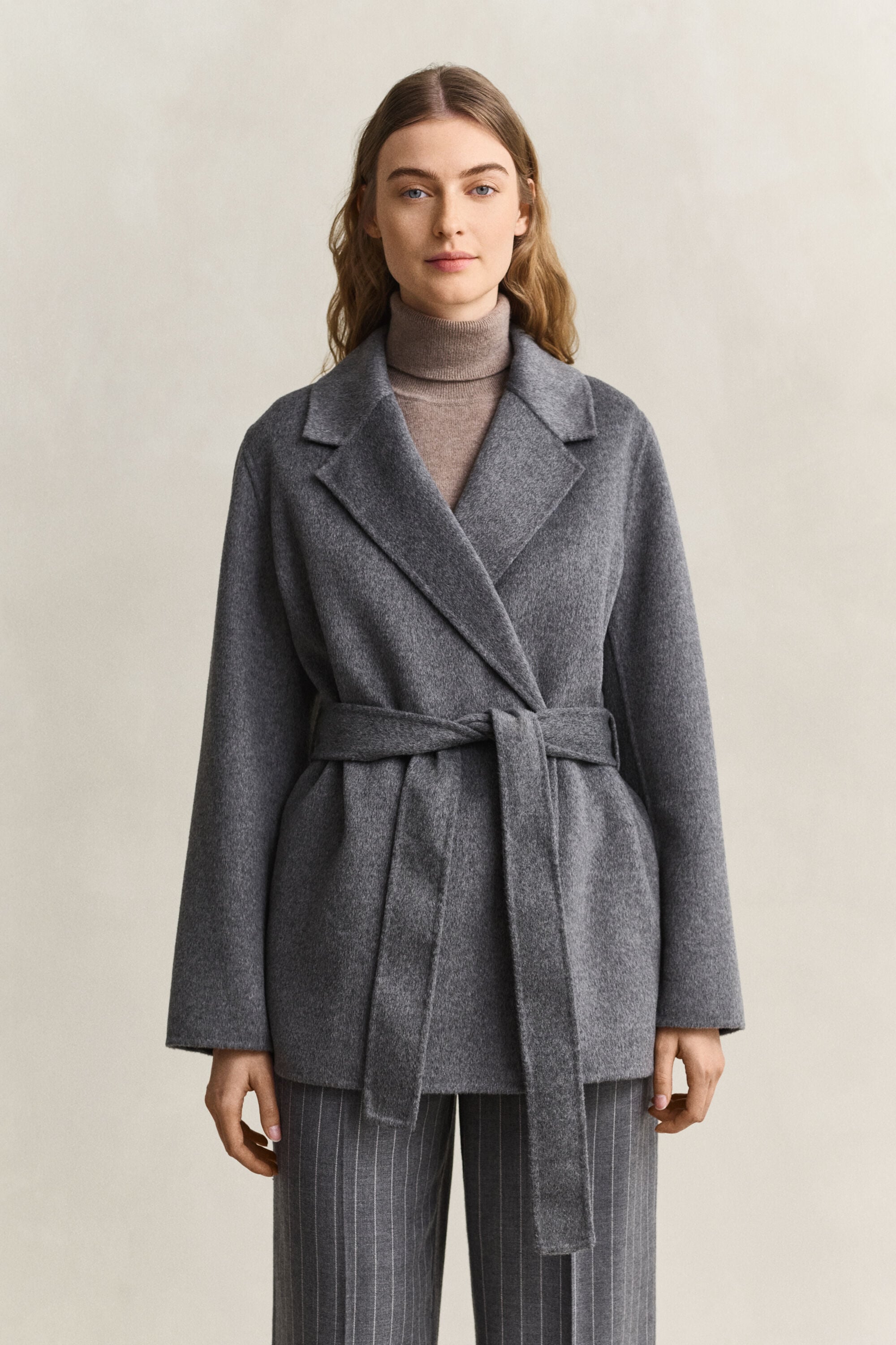 Giacca cucita a mano con cintura