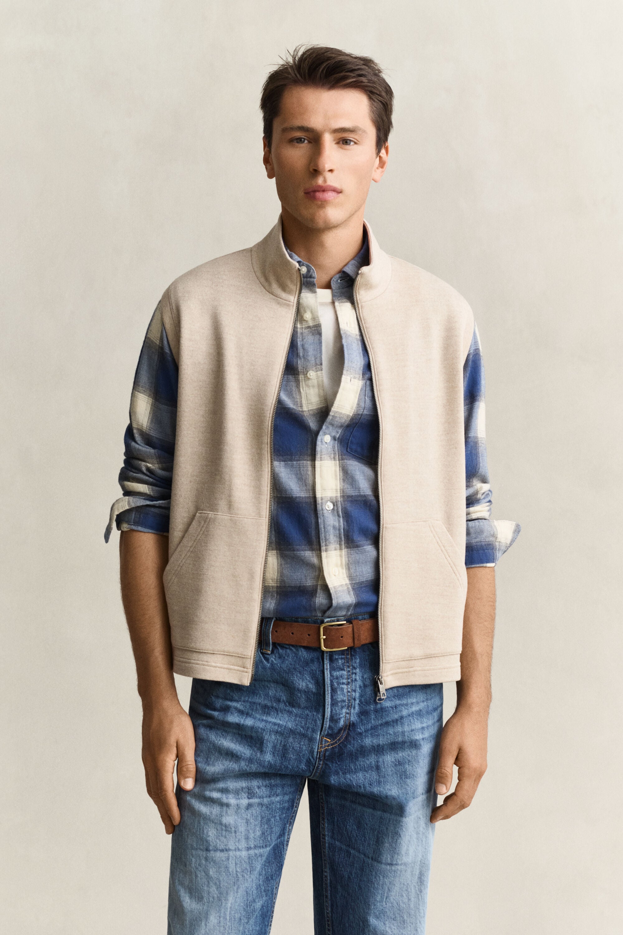 Piumino smanicato con zip