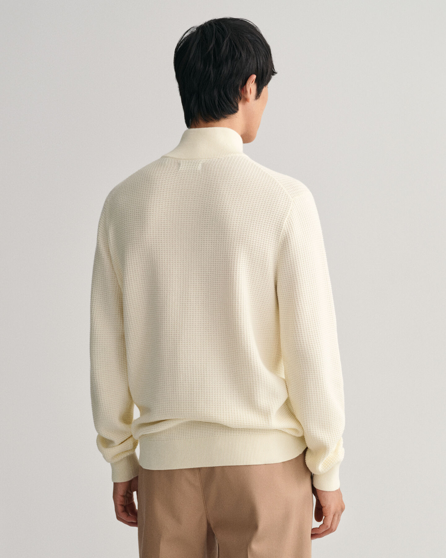 Maglia in cotone testurizzato con zip corta