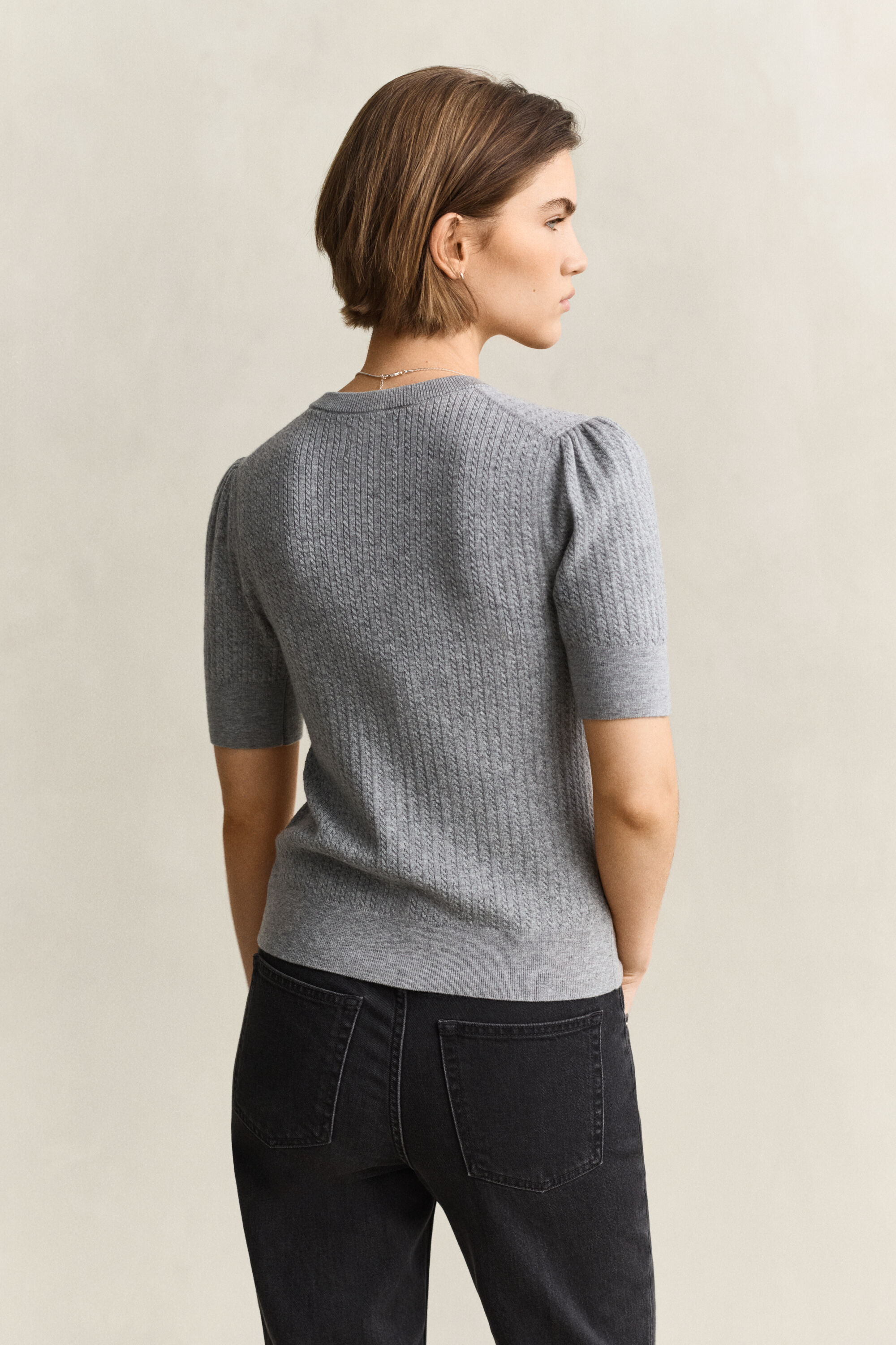Cardigan a trecce con maniche corte