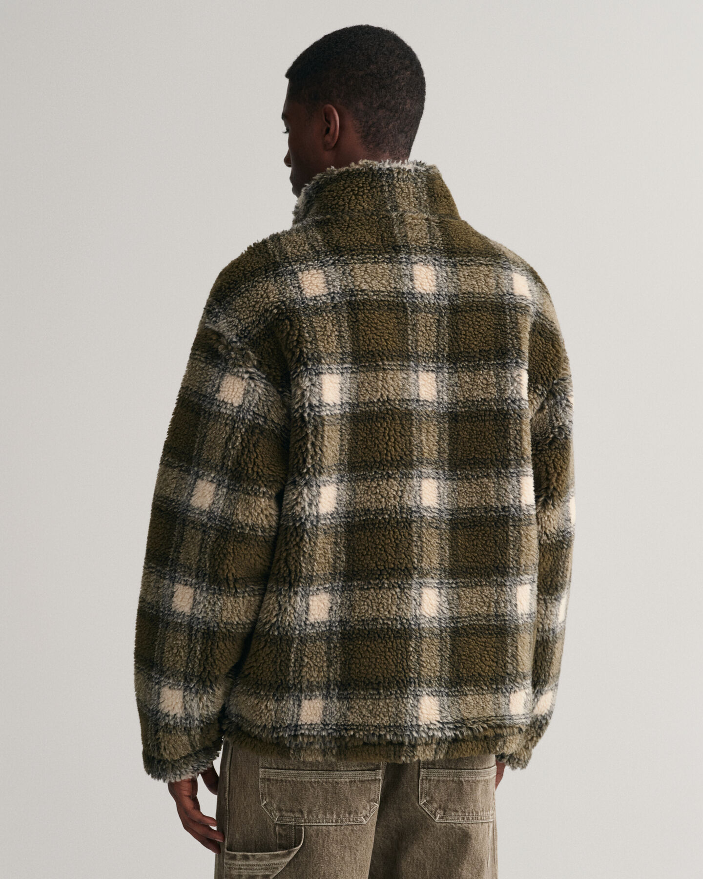 Giacca in pile a quadri con zip